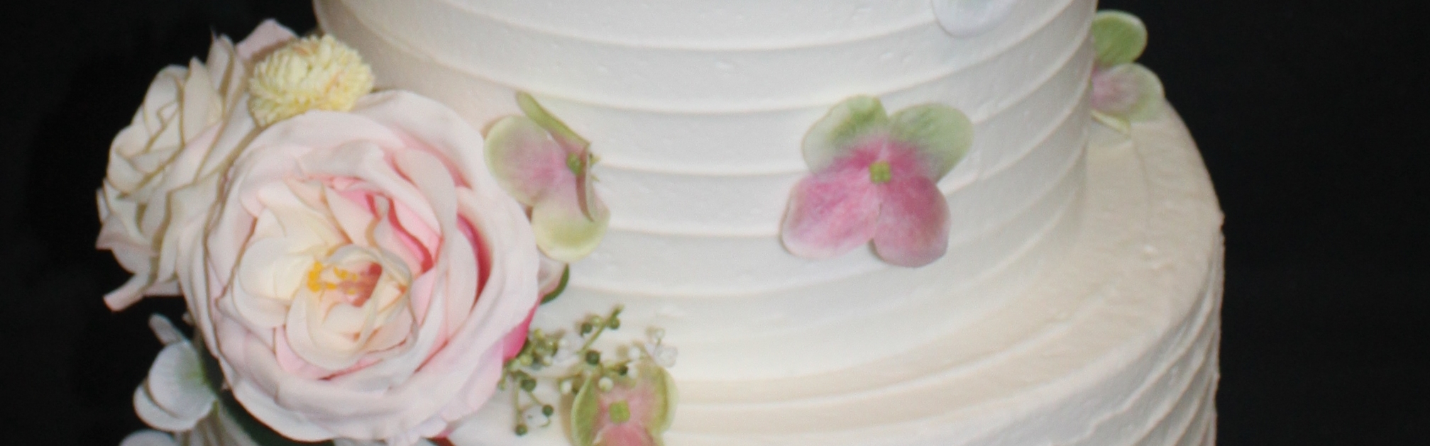 9a6e758a-e06f-4d8c-be7d-5e371fc44348-Dior with faux pink flowers.JPG